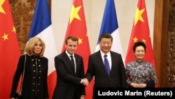 Франция президенти Эммануэл Макрон жана Кытайдын лидери Си Цзинпин жубайлары менен. 8-январь, 2018-жыл. Бээжин.