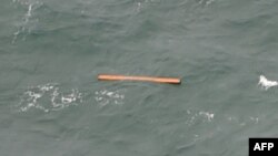 Ինդոնեզիա - Ջավայի ծովում հայտնաբերված բեկորներից, 30-ը դեկտեմբերի, 2014թ․