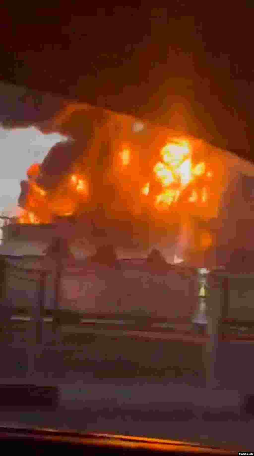 Flames rise from the processing plant on April 28 in an image obtained by Reuters from social media. 