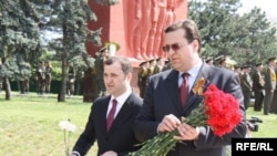 Vlad Filat (left) and Marian Lupu attend Victory Day celebration on May 9 -- is one coalition too small for the two of them?