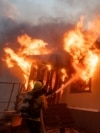 Palisades Fire burns during a windstorm on the west side of Los Angeles