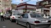 IRAN -- Iranian drivers queu up in long lines at a gasoline station in Tehran, May 1, 2019