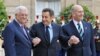 France -- Palestinian President Abbas (L), French President Sarkozy (C), and Isreali PM Olmert at Elysee Palace on 13jul2008