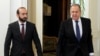 Russia - Russian Foreign Minister Sergei Lavrov and Armenian Foreign Minister Ararat Mirzoyan enter a hall during a meeting in Moscow, April 8, 2022. 