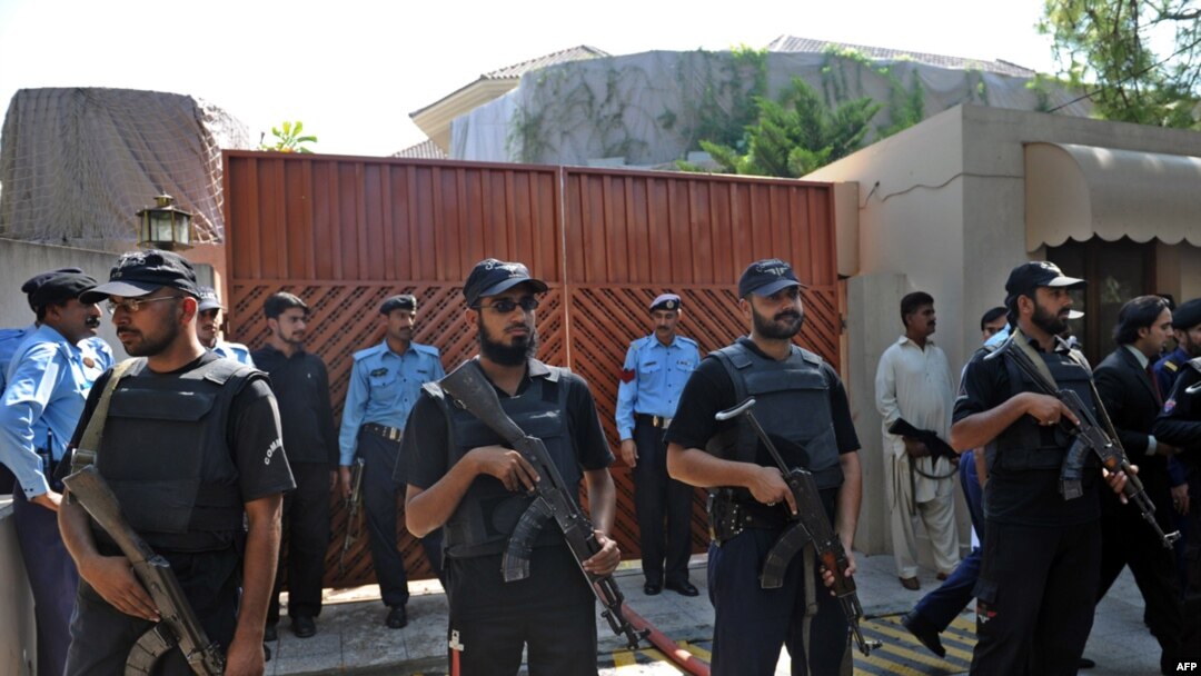 Police commandos guard a UN office in the wake of the suicide blast on October 5.