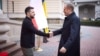 Ukrainian President Volodymyr Zelenskiy (left) meets Polish Prime Minister Donald Tusk in Lviv on December 17. 