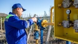 Moldova: Employee of Moldova Gaz working on the expansion of gas distribution networks in southern Moldova.