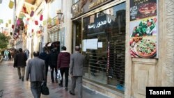 A money exchange bureau in Tehran's Ferdowsi Ave where most exchange bureaus are located. FILE PHOTO.