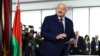 Belarusian President Alyaksandr Lukashenka votes during the presidential election in Minsk on January 26.