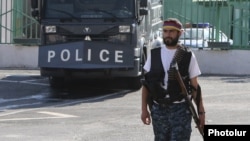 One of the opposition gunmen occupying a police station in Yerevan.