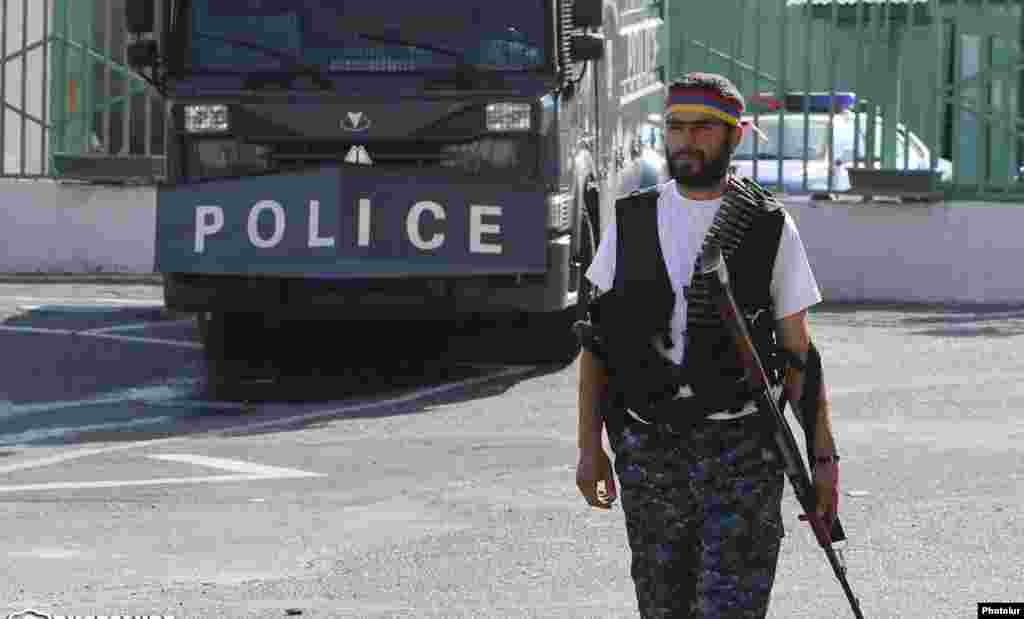 Armenia - One of the opposition gunmen occupying a police station in Yerevan, 23Jul2016.