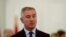 LATVIA -- Montenegro's President Milo Djukanovic leaves news conference in Riga, Latvia March 11, 2020.