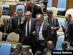 U.S. -- Azerbaijani Foreign Minister Elmar Mammadyarov (C) during a contest with Slovenia for a fifth and final non-permanent, two-year seat on the Security Council, beginning in 2012, New York, 24Oct2011