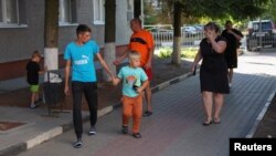 Belgorod sebitinden ewakuasiýa edilen adamlar