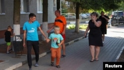 Russian civilians are evacuated from the Belgorod region on August 12