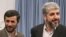Iranian President Mahmud Ahmadinejad (left) with Hamas leader Khalid Mish'al (file photo)