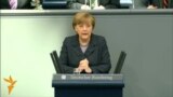 Merkel Warns Russia Of 'Massive' Damage Over Crimea