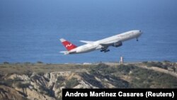 Վենեսուելա - Ռուսական Nordwind ավիաընկերության Boeing 777-200ER օդանավը թռիչք է կատարում Կարակասի օդանավակայանից, 30-ը հունվարի, 2019թ․