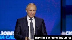 Путин Москвадагы форумда сүйлөп жаткан кези. 28-ноябрь, 2018-жыл. 