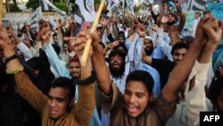 Pakistani Islamist activist shout anti-Indian slogans during a demonstration in Karachi on October. (file photo)