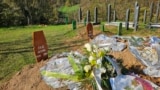 Bosnia, Donja Jablanica, cemetery, the graves of two young people who died in the floods on October 4