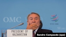 Kazakh President Nursultan Nazarbaev warns that Nazabaev warned that his country faces a period of belt-tightening.
