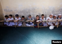 Afghan boys read the Koran in a madrasah in Kabul. Transforming Afghanistan’s education system has been one of the Taliban’s main goals since it regained power.