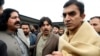 FILE: Leaders of the Pashtun Tahafuz (Protection) Movement or (PTM), Mohsin Dawar, right, and Ali Wazir, left, arrive at National Press Club in Islamabad, for a protest in January.