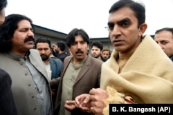 PTM leaders Mohsin Dawar (right) and Wazir (left) join a protest at the National Press Club in Islamabad in January 2020.