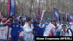 Финал эстафеты огня. Факел несет Олег Матыцин, президент FISU