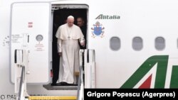 Pope Francis arrives at the Henri Coanda International Airport in Bucharest on May 31. 