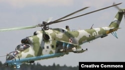 A Russian Mi-35 attack helicopter with transport capabilities