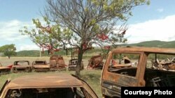 Burnt-out cars around Tskhinvali after last year's fighting (Photo: Tomas Polacek)