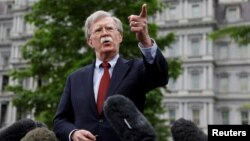 U.S. National Security Adviser John Bolton talks to reporters at the White House in Washington, U.S., May 1, 2019.