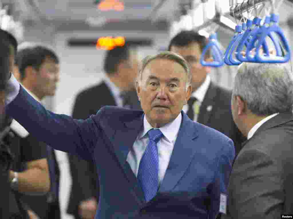 Kazakh President Nursultan Nazarbaev rides in a carriage during a visit to the Almaty subway. The Almaty subway will be opened later this year.Photo by Shamil Zhumatov for Reuters
