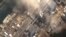 Japan - The No.3 nuclear reactor of the Fukushima Daiichi nuclear plant at Minamisoma is seen burning after a blast following an earthquake and tsunami in this handout satellite image taken 14Mar2011