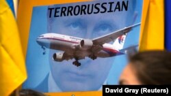 Протест проти збиття російськими гібридними силами літака рейсу MH17 в Австралії, яка теж втратила в ньому багато своїх громадян. Сідней, 19 липня 2014 року