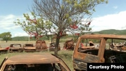 Burnt-out cars around Tskhinvali after last year's fighting (Photo: Tomas Polacek)