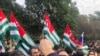 Protesters rally outside the parliament building in the capital of Georgia's breakaway region of Abkhazia