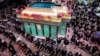 Shia Muslim devotees pray while attending a mourning ritual at the Karbala Mosque in Tehran on June 25 at the peak of Ashura, a 10-day period commemorating the seventh-century killing of Prophet Muhammad's grandson Imam Hussein.