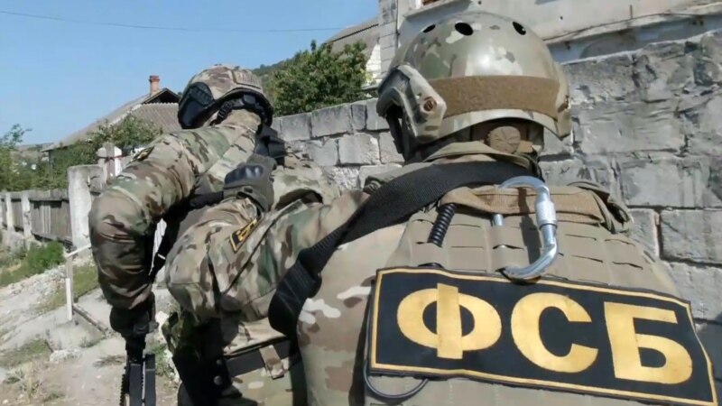 Group Of Crimean Tatars Detained In Russian-Occupied Crimea After Homes Searched