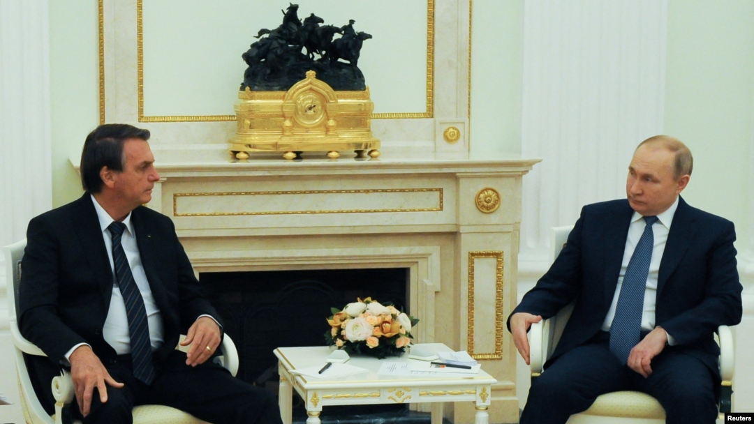 Russian President Vladimir Putin (right) meets with his Brazilian counterpart, Jair Bolsonaro, in Moscow on February 16. 