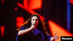 Ukraine's Jamala, a Crimean Tatar, performs her winning song 1944 during the Eurovision Song Contest final in Stockholm. The heart-rending song recalls how Soviet dictator Josef Stalin ordered the mass deportation of her entire nation to Central Asia in 1944. (ITT News Agency/Maja Suslin/via Reuters)
