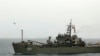 In this image released on July 15 by the Iranian Army, a drone is launched from an Iranian warship during a drill in the Indian Ocean.