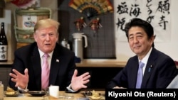 Donald Trump și Shinzo Abe