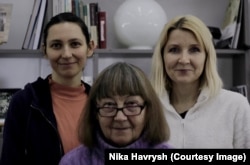 The team scanning materials from the archaeological department of Ukraine's National Academy of Sciences. Left to right are Tamara Kutsaieva, Halyna Stanytsina, and Oleksandra Buzko. (Photo courtesy of Nika Havrysh)