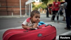 Мігранти в черзі на реєстрацію заяв про статус біженця, Берлін, фото 10 серпня 2015 року