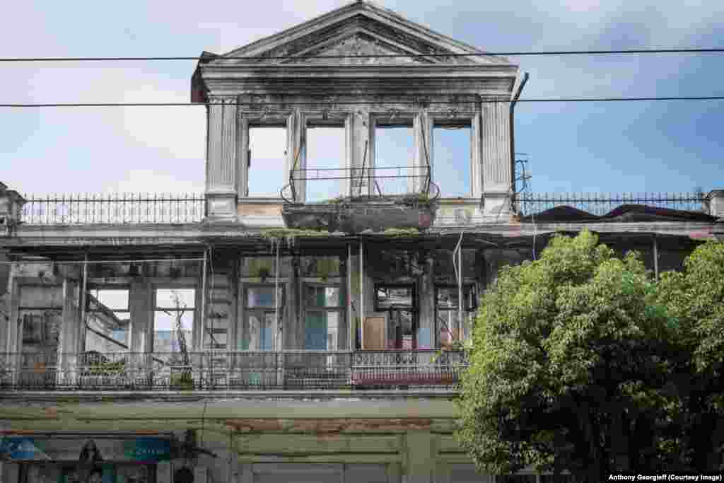 Once the playground of the Soviet elite and a destination for Soviet workers, Sukhumi is littered with bombed-out buildings that have remained derelict since the 1992-1993 conflict. 