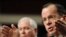 U.S. Chairman of the Joint Chiefs of Staff Admiral Mike Mullen testifies before the Senate Armed Services Committee on February 2, with Defense Secretary Robert Gates looking on.