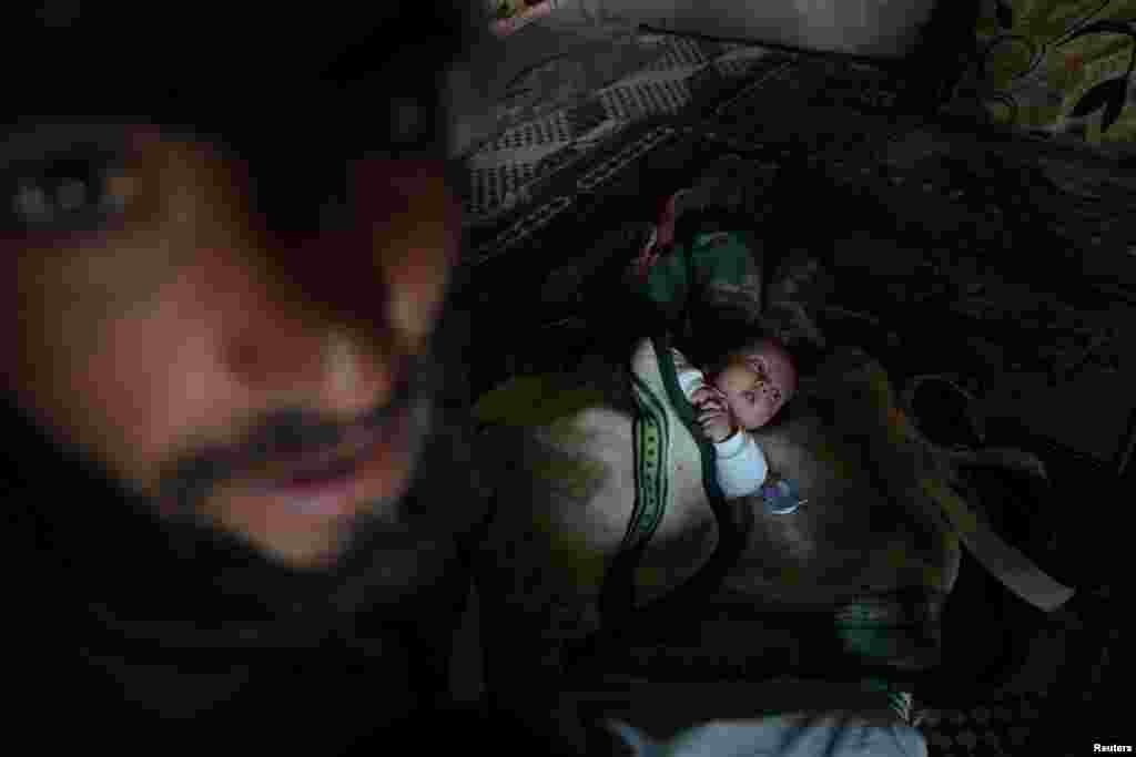 ДАIИШ-ах муъкаяккхинчу Раккина гергарчу Бир СаIида юьртахь (Reuters / Роди Саид).